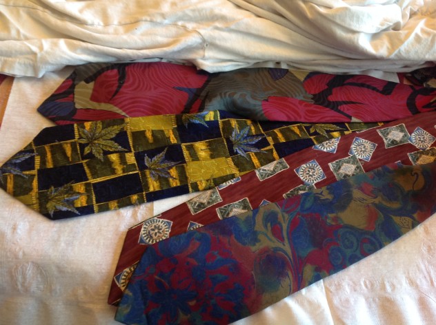 If you can find some silk designer ties from the 80s with small repetitive patterns, they work best for tie dyed eggs,